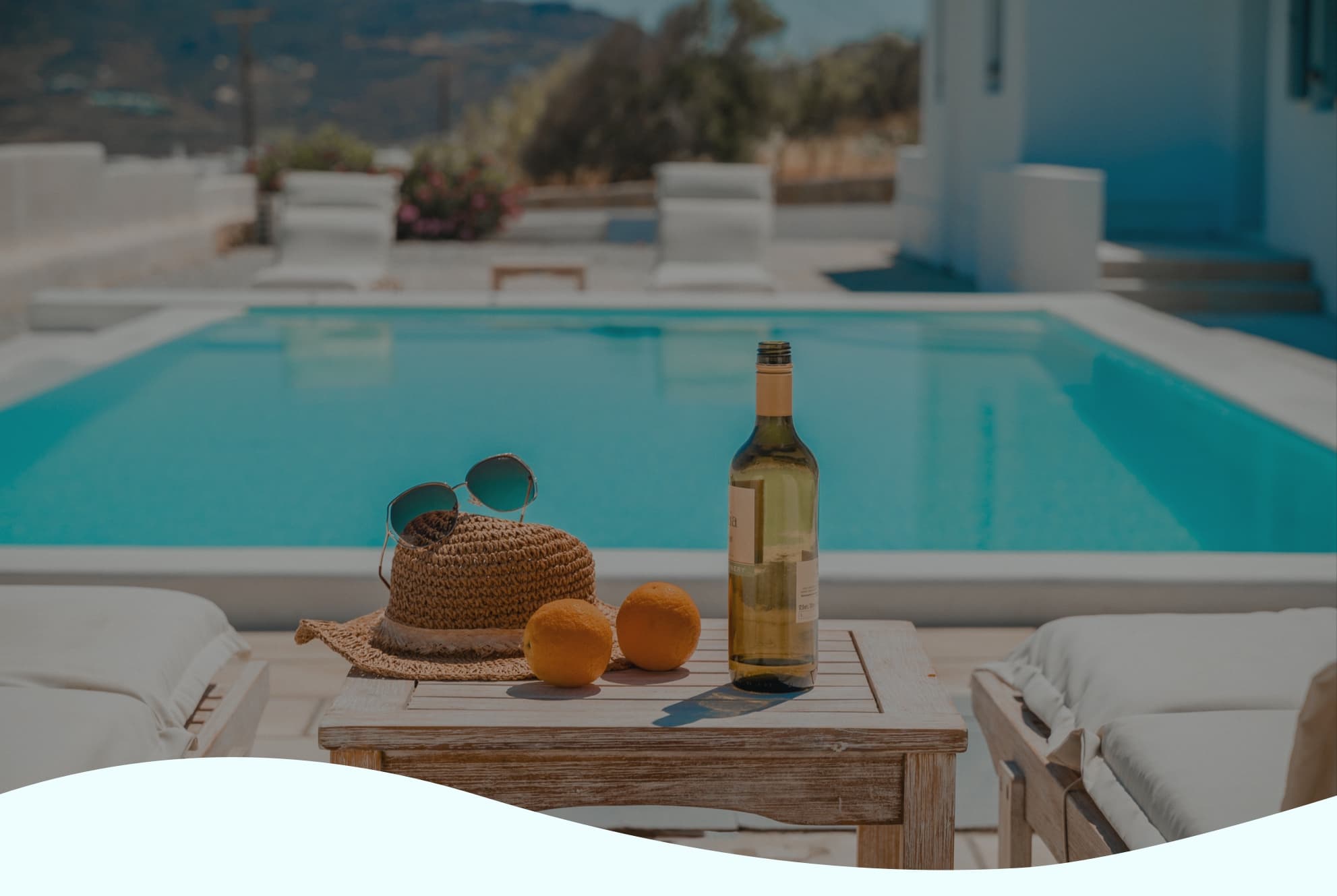 a summer view of a hotel swimming pool